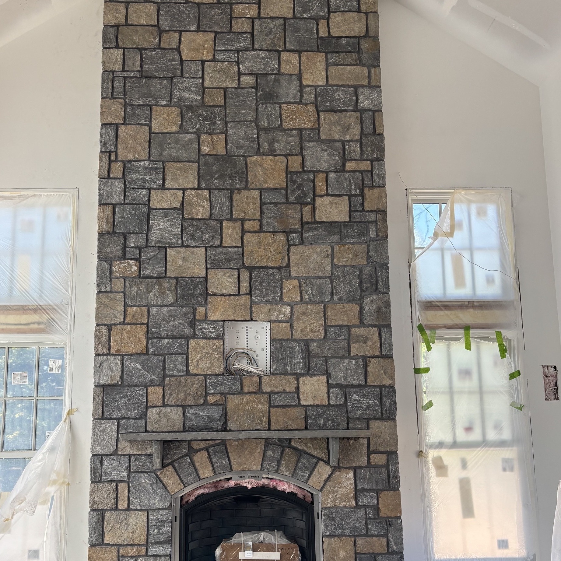 Cathedral stone fireplace